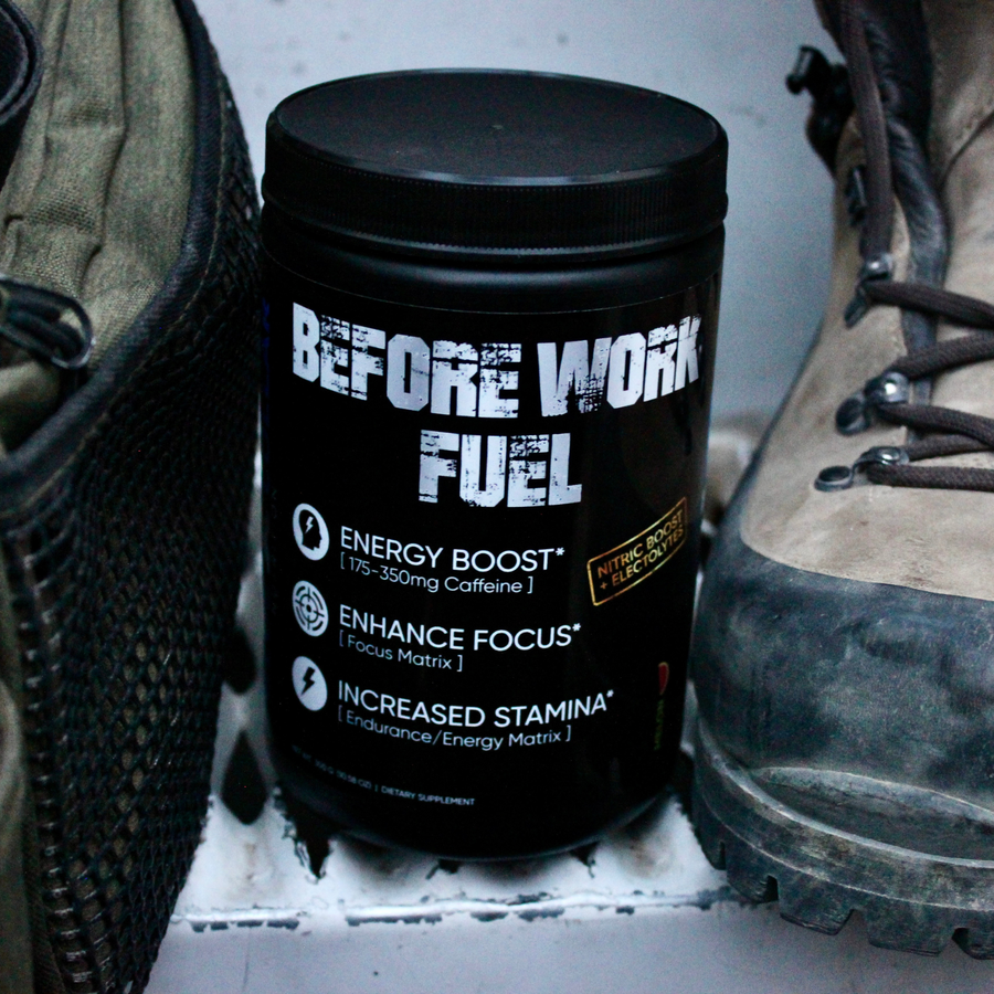 Before Work Fuel powdered energy drink next to work boots and field gear, built for tradesmen and physical workers