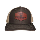 BCN Classic Trucker Curved Hat in two-tone dark brown front and tan mesh back with hexagonal cognac leather patch — front view