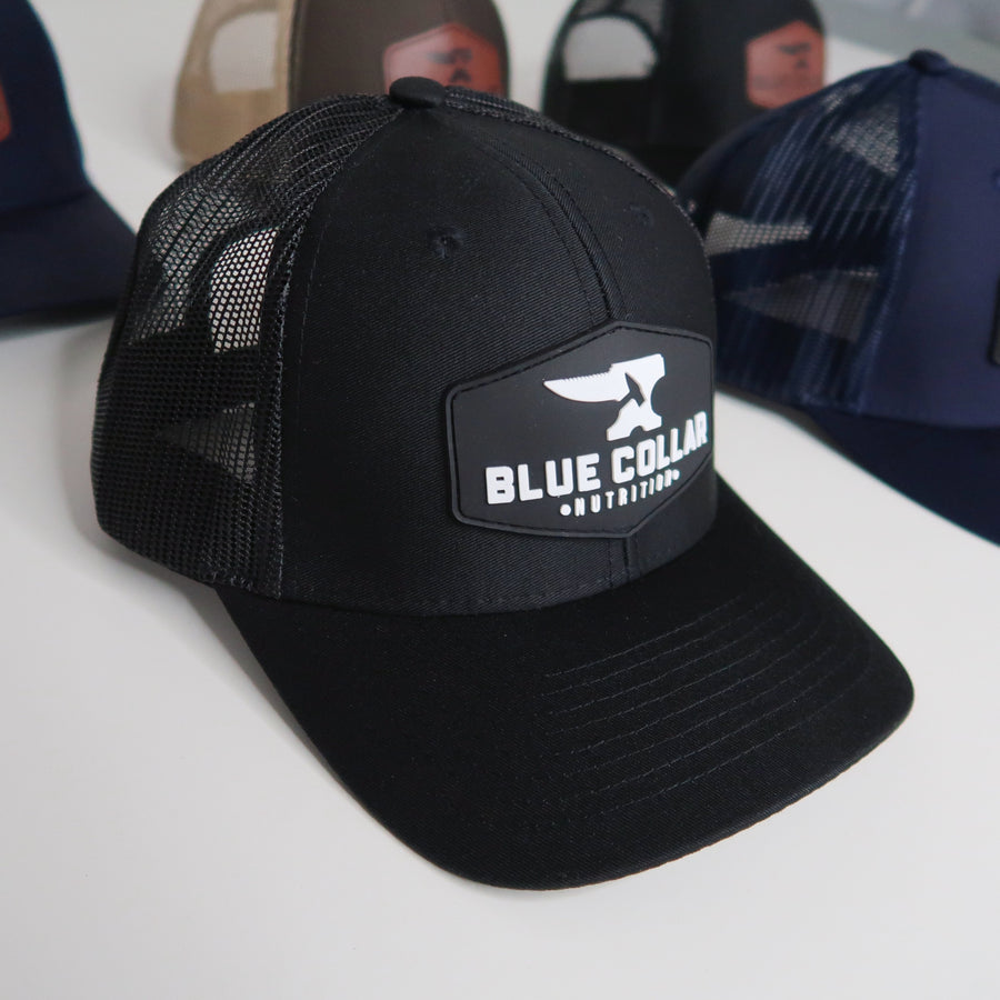 Black cap with 'Blue Collar' logo on a white background