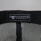 Interior tag of the BCN Classic Trucker Hat reading Blue Collar Nutrition Trucker Adjustable Snapback