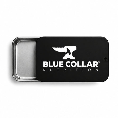 Blue Collar Nutrition slide-top supplement tin closed, showing the anvil logo on a matte black metal pill case